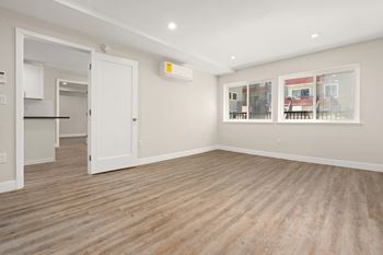 Primary Bedroom with Wood Floors at Woodland Trio Apartments, California, 91601